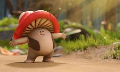 a small toy with a mushroom on it's head is standing in the dirt