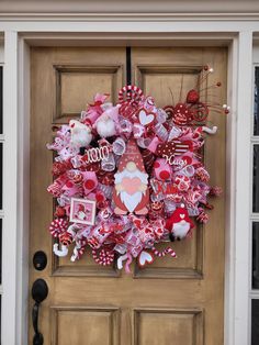 a valentine's day wreath on the front door