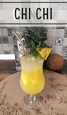 a pineapple drink in a glass on a table