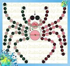 this is an image of a cross stitch pattern with beads and flowers in the center