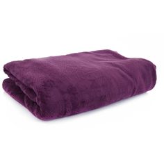 a purple blanket is folded on top of a white background