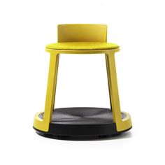 a yellow stool sitting on top of a white floor next to a black and gray object