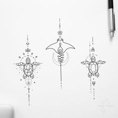 three different designs on a white wall next to a pen and ink drawing pencils