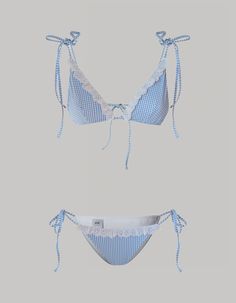 The Sophie bikini is an exquisite fusion of contemporary allure and playful elegance. The triangle bikini top and adjustable low-rise bottoms showcase a mesmerizing blue gingham pattern, adorned with Sangallo ribbon lace details. Expertly crafted from our luxurious Vichy print stretch ribbed fabric, this bikini guarantees a flattering silhouette with its padded bra for comfort. The Sophie bikini effortlessly combines fashion-forward design with classic femininity for a summer style statement. Senior Trip Outfits, Gingham Outfit, Unique Bikinis, Gingham Pattern, Summer Lookbook, The Triangle, Cute Swimsuits, Cute Bikinis, Printed Swim