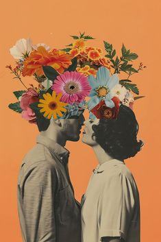 two people standing next to each other with flowers on their heads in front of an orange background