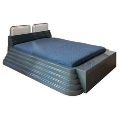 an inflatable bed with two mattresses on each side and no headboard