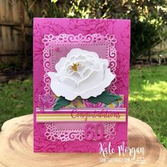 a close up of a card with a flower on it