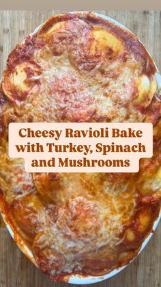 cheesy ravioli bake with turkey, spinach and mushrooms in a white dish