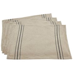 four linen placemats with black stripes on them