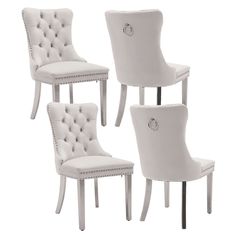 three white chairs with buttons on the back and one is upholstered in leather