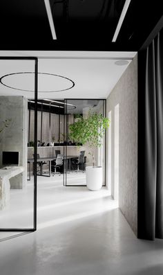 an empty room with black and white decor