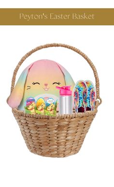 a basket filled with lots of toys and items to put in it, including an easter bunny