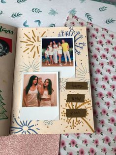 an open scrapbook with pictures of people and fireworks