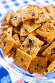 a plate full of crackers with raisins on them