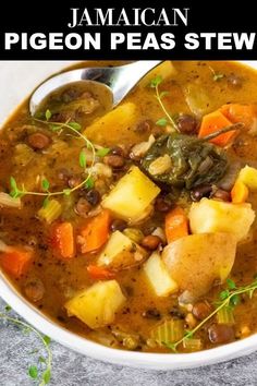 a white bowl filled with stew and vegetables