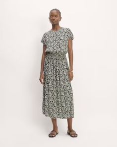 The Gathered Midi Dress Black / Bone Mini Floral – Everlane Casual Midi Dresses, Fall Midi Dresses, Casual Rayon Midi Dress With Smocked Back, Casual Smocked Dress With Ruched Flowy Skirt, Casual Flowy Maxi Dress, Chic Short Sleeve Maxi Dress With Gathered Waist, Casual Short Sleeve Maxi Dress In Viscose, Casual Midi Dress With Smocked Back And Flowy Skirt, Casual Midi Dress With Elastic Waistband For Daywear