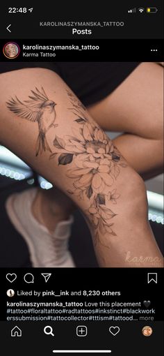 the back of a woman's leg with flowers on it