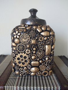 a decorative vase sitting on top of a table