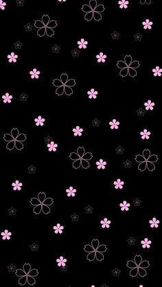 a black background with pink and white flowers in the shape of four leaf clovers