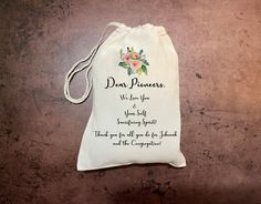 a drawstring bag with a poem written on it