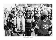 a black and white photo of people with roller skates on the street in front of a crowd