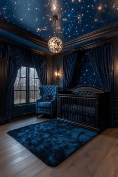 a baby's room with stars painted on the ceiling and a blue chair next to it