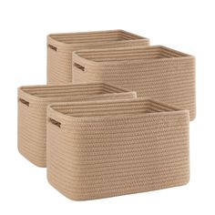 three beige storage baskets with handles