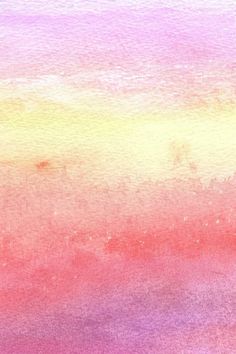 an abstract watercolor background with pink, yellow and purple hues in the sky