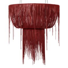 a red chandelier with fringes hanging from it's sides on a white background