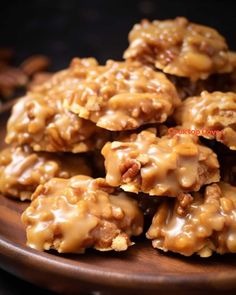 some cookies are stacked on top of each other and covered in caramel glaze