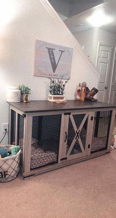 a room with a dog bed and some baskets on the floor