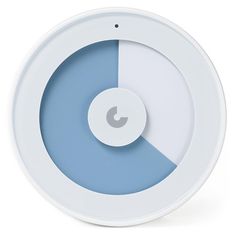 a white and blue clock with an arrow on the front, showing that it's time