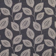 a black and white fabric with leaves on it