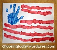 an american flag made out of handprints on paper