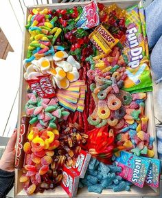 a box filled with lots of colorful candy