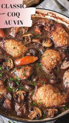 a close up of a pan of food with chicken and carrots in gravy