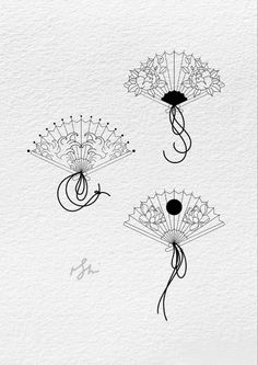 three black and white drawings of flowers