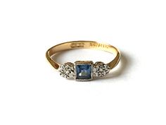 https://jewelrysalehub.com/ This is a beautiful and elegant Art Deco Sapphire and Diamond ring. The ring has one princess cut Sapphire in a platinum bezel setting and two little Diamonds in an illusion star platinum setting. This is a fine 18ct gold and platinum Art Deco ring which is 4mm approx. Art Nouveau Engagement Ring, Art Deco Sapphire Ring, Star Platinum, Art Deco Wedding Ring, Vintage Art Deco Rings, Art Deco Wedding Rings, Sapphire And Diamond Ring, Anniversary Jewelry, Wardrobe Inspiration