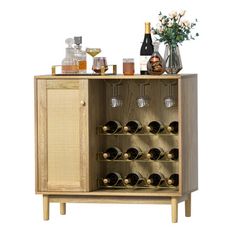 a wooden cabinet with wine glasses and bottles