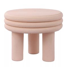 three pink stools stacked on top of each other