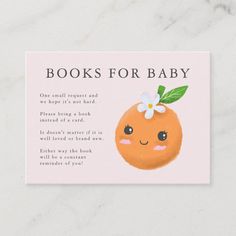 an orange with a flower on it's head and the words books for baby written below