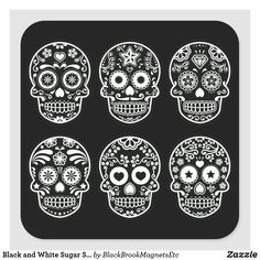 six sugar skulls on black paper with white outlines, all in different shapes and sizes