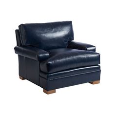 a black leather chair with wooden legs