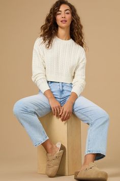 This cable-knit crop sweater is perfect for layering over your favorite dresses or rocking with jeans. This effortlessly chic pullover adds a touch of texture to your fall wardrobe. Altard State Fall Outfits, Cropped Sweater Outfit Fall, Cropped Sweater Outfit, Cable Knit Sweater Outfit, Football Dress, White Sweater Outfit, Cute Sweaters For Fall, Knit Sweater Outfit, Family Picture Outfits