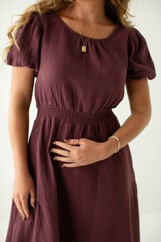 A bestseller, now in a new print + shade! The 'Alicia' midi dress is made out of a comfortable and breathable cotton gauze fabric. Choose between a beautiful dainty floral pattern, or an elegant plum color. Or maybe you just need both! Add low ankle boots and a shoulder bag for a charming fall brunch look with friends! Exclusively designed by us with you in mind. 100% Cotton Hand Wash Cold Do Not Bleach Hang to Dry Low Iron if Needed Do Not Dry Clean Fully Lined Maternity/Bump Friendly! Model in Cotton Gauze Dress, Fall Brunch, Low Ankle Boots, Cotton Gauze Fabric, Gauze Dress, Gauze Fabric, Layered Tops, Plum Color, Skirt Leggings