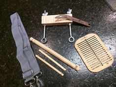 the kitchen utensils are laid out on the table