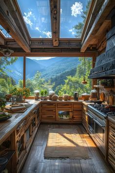 an open kitchen with wooden cabinets and mountains in the backgroung, as seen from inside