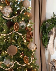 a christmas tree decorated with ornaments and lights