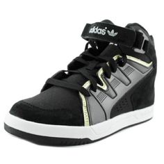 New Mc-X1 Women's Adidas Originals Trefoil. Black, Gold & White. Shimmering Breathable Top Details Patent Leather Trim. Velcro Strap Details. Adidas Trefoil Logo On Every Side! Adidas Us5 Is Equivalent To Eu36 Adidas Iniki Runner, Adidas Sleek, Adidas White Sneakers, White Shoes Sneakers, Adidas Trainers, Adidas Trefoil, Sneakers Adidas, High Top Sneaker, Black Trainers