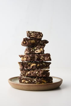 a stack of chocolate bars sitting on top of a plate